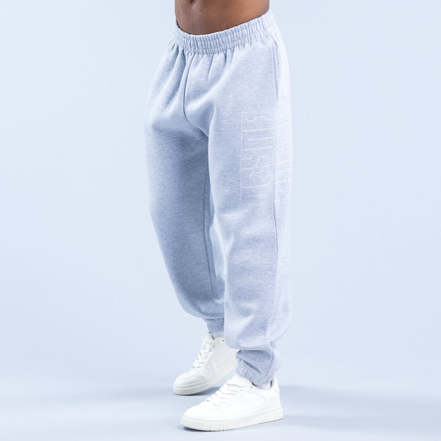 Light blue graphic joggers, rear view, elastic waistband and ribbed cuffs, with white sneakers