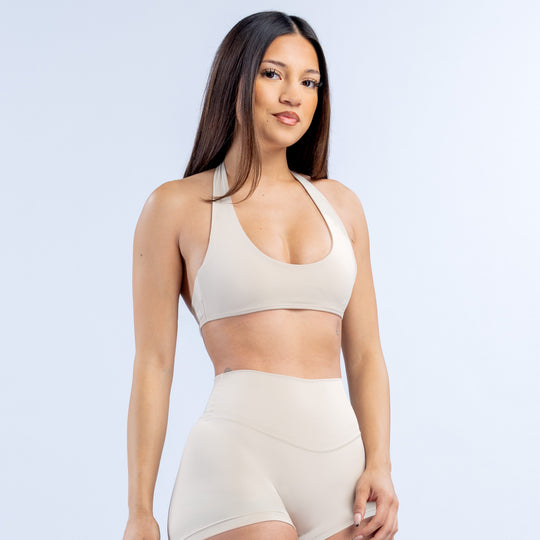 Cream backless halter bra with halter neck ties and supportive underband