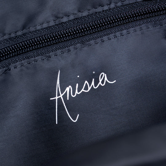 Anisia mini duffle bag, dark fabric with white embroidered logo