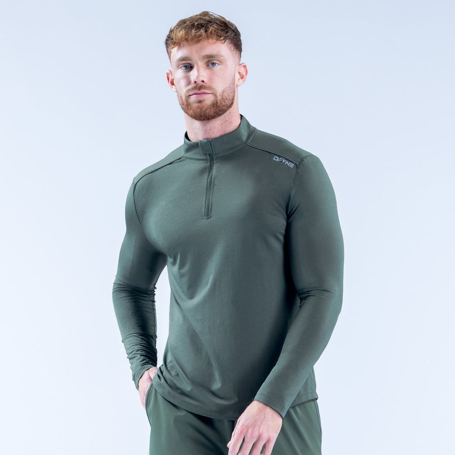 Men's olive green quarter-zip long-sleeve performance top with half zipper collar