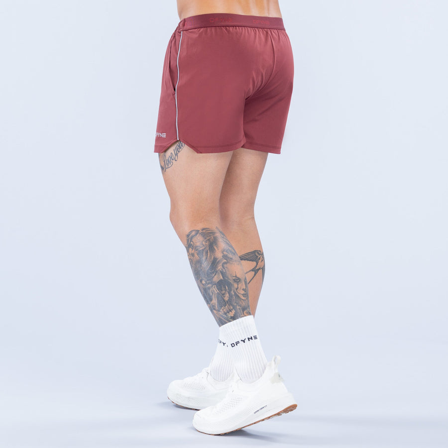 Burgundy 4-inch training shorts, rear view, elastic waistband and side piping