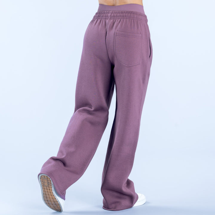 Purple wide-leg jogger pants with elastic waistband and back patch pockets