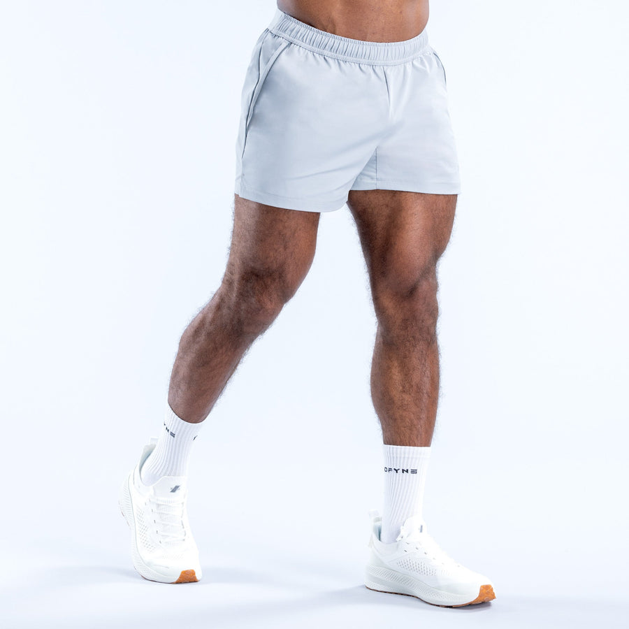 Men's light blue training shorts, 4-in inseam, side seams, elastic waistband
