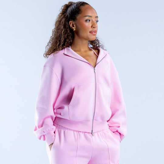 Lilac zip-front hoodie with kangaroo pocket and ruffled waist detail