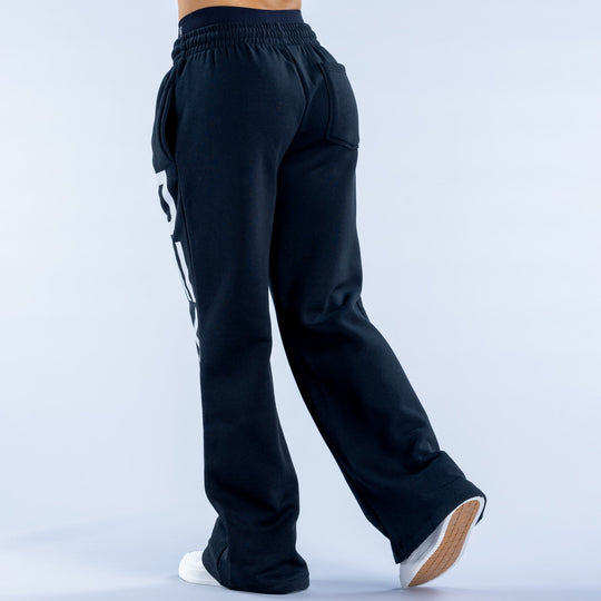Dark navy wide-leg jogger pants, back view, elastic waistband and relaxed fit