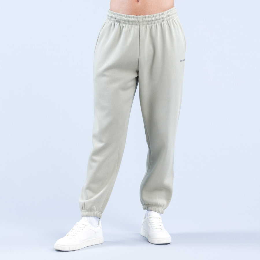 Light sage jogger pants with elastic waistband and tapered cuffed ankles