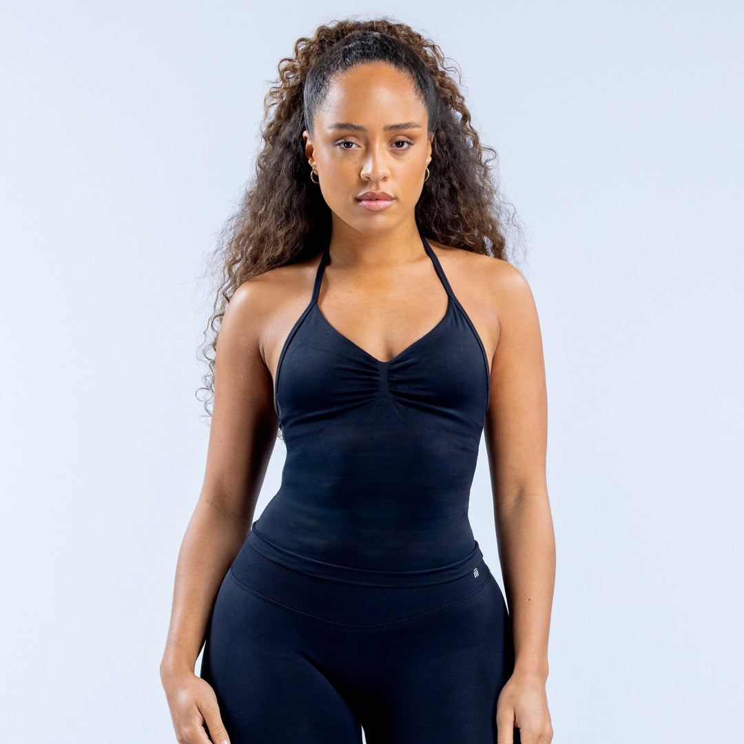 Dark navy longline strappy halter top with ruched bust and fitted long hem.