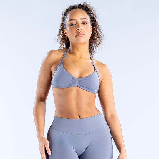 Women’s strappy sports bra, light blue triangle cups with ruched center and thin straps
