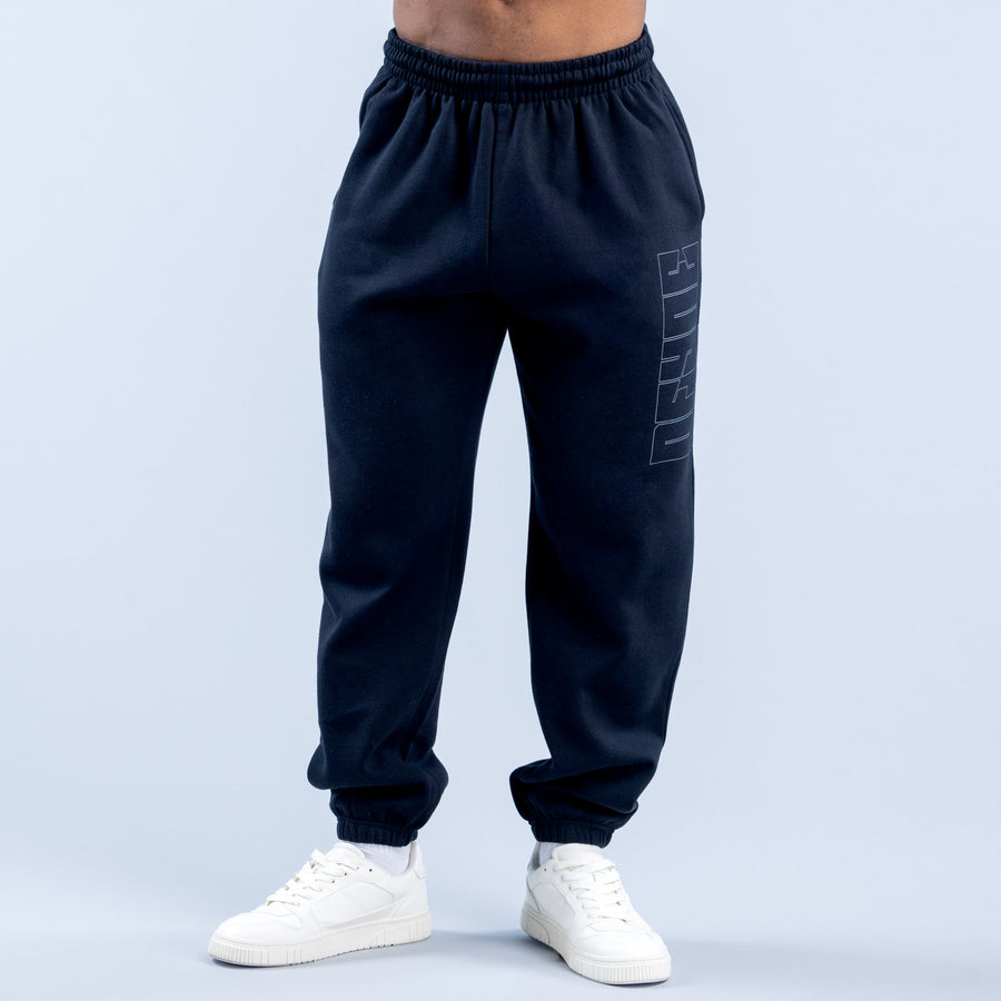 Dark navy graphic jogger pants with elastic waistband and cuffed ankle hems