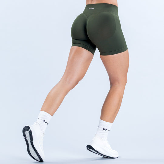 Dark green fitted shorts with a high waistband, shown from the back.