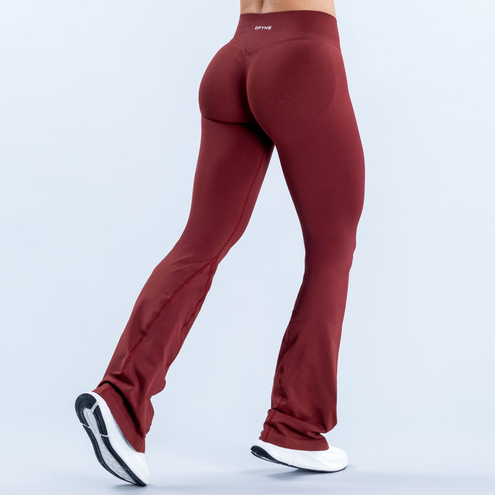 Burgundy flared leggings with a high waistband, shown from the back