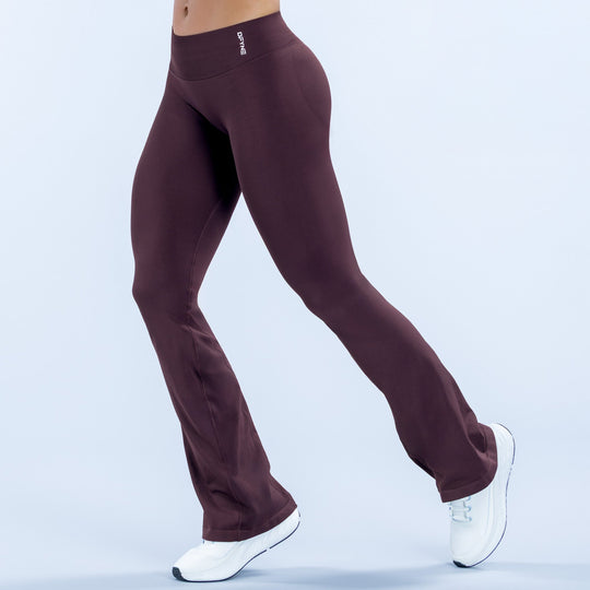 Maroon flare leggings with small chest-height logo, bootcut hem, sporty stretch fabric
