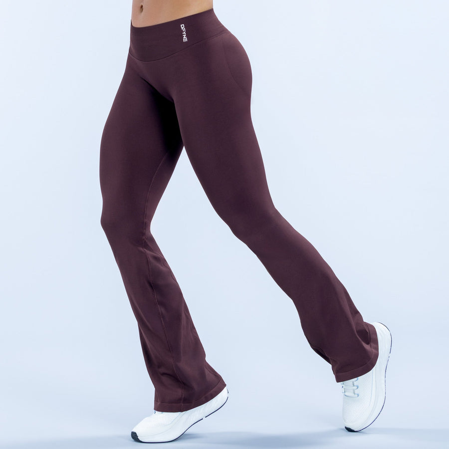 Maroon flare leggings with small chest-height logo, bootcut hem, sporty stretch fabric