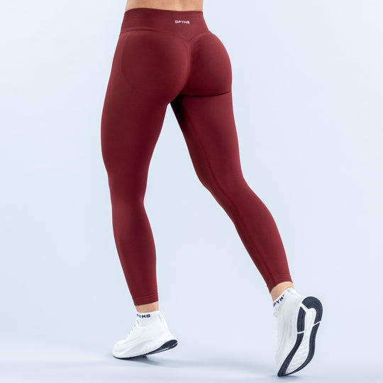 Burgundy ankle-length leggings shown from the back, with a wide high-rise waistband