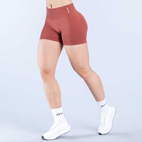 Rust red 4.5-inch impact shorts with elastic waistband