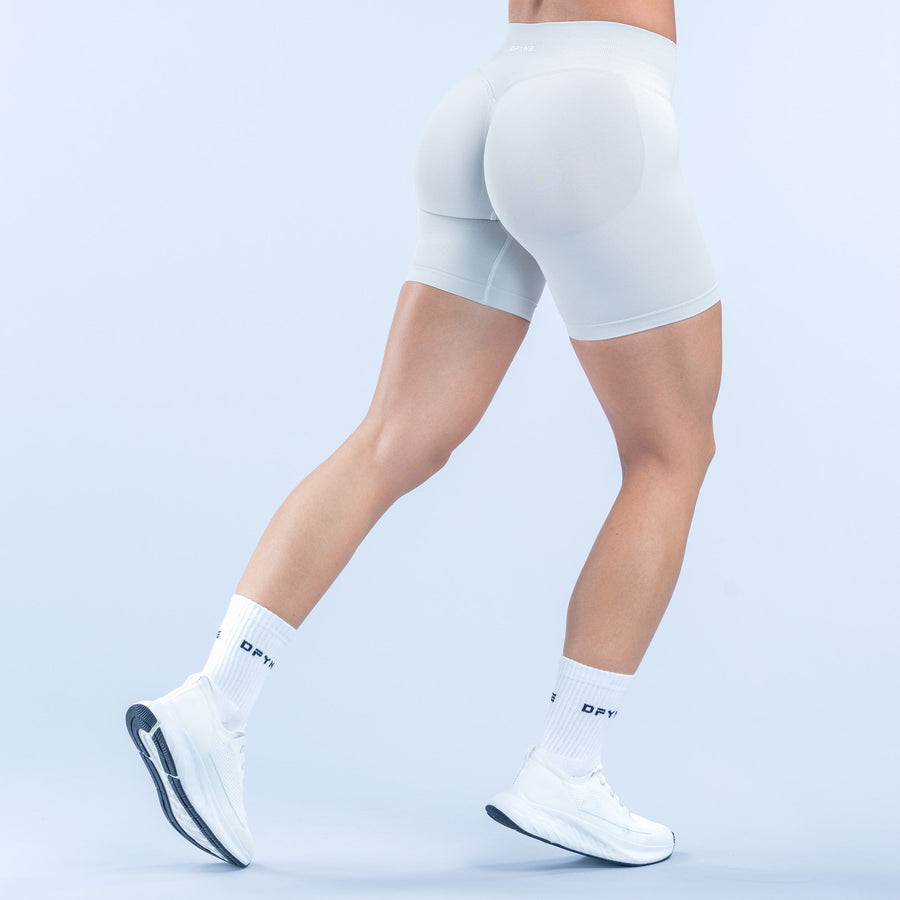 Light blue 6.5-inch athletic shorts, rear view, smooth stretch fabric