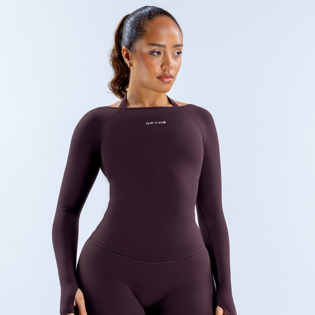 Origin long-sleeve scoop-neck top in dark plum, front view