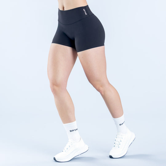 Black athletic shorts with high-rise waistband, 4.5-inch inseam