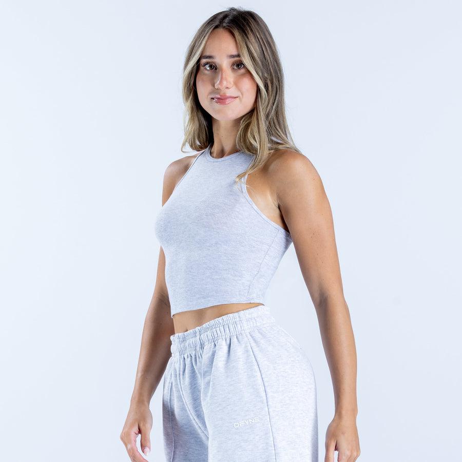 Light gray ribbed racerback vest with cropped front and fitted texture