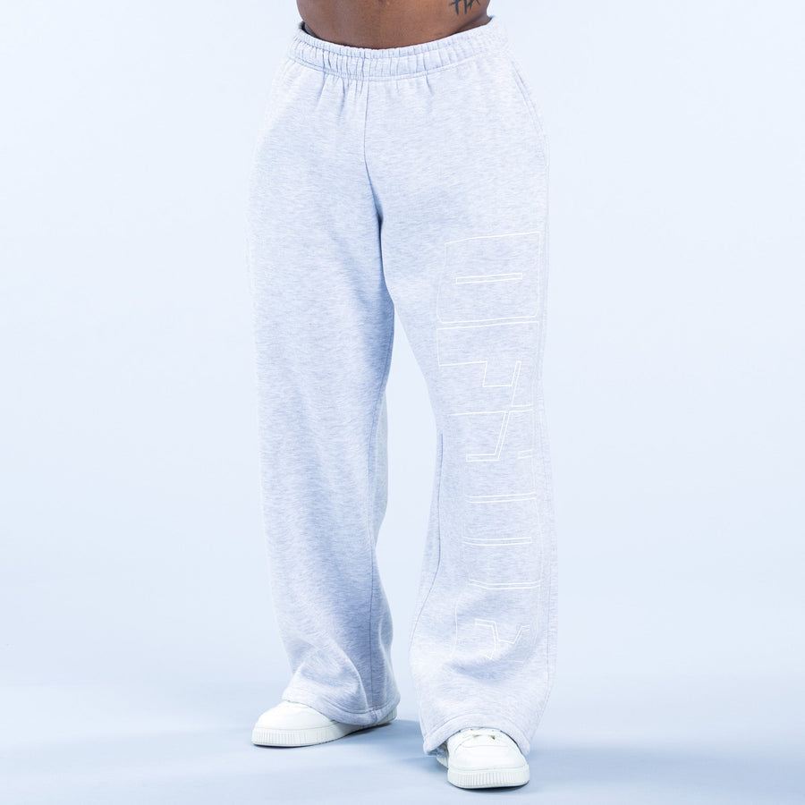 Light gray straight-leg joggers with elastic waistband and front graphic print
