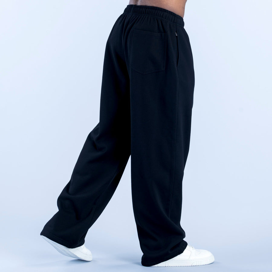Dark straight-leg joggers with elastic waistband and side pockets
