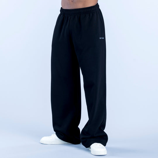 Dark straight-leg joggers with elastic waistband and draped fabric