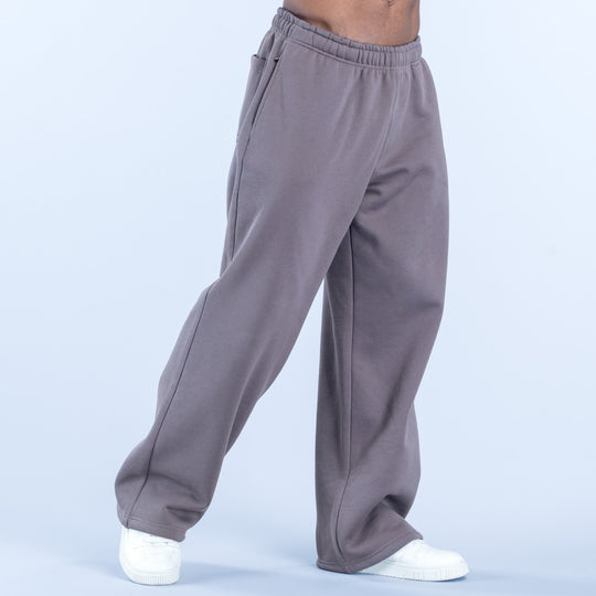 Dark gray straight-leg joggers with elastic waist and visible side seam stitching