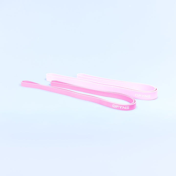 Pink resistance bands, flat loop straps shown
