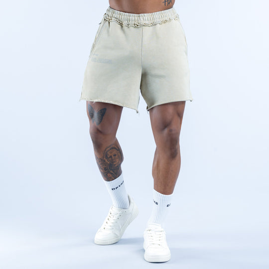 Light sage washed shorts with elastic waistband and cuffed hem, side view