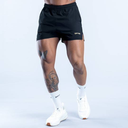 Men's black training shorts with elastic waistband and small side logo