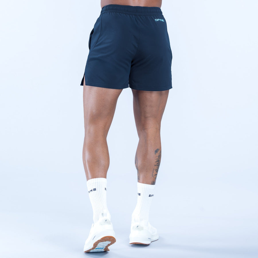 Navy training shorts with elastic waistband and back pocket opening